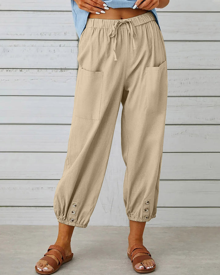 Pantalon taille haute bouton neuf points