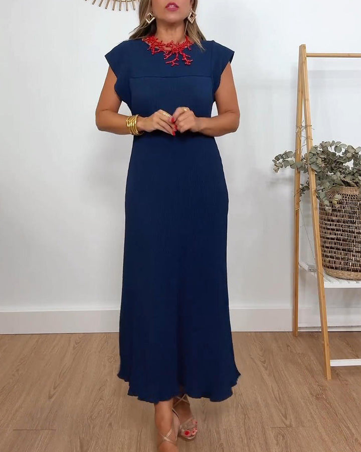 Véronique | Robe plissée simple sans manches de couleur unie