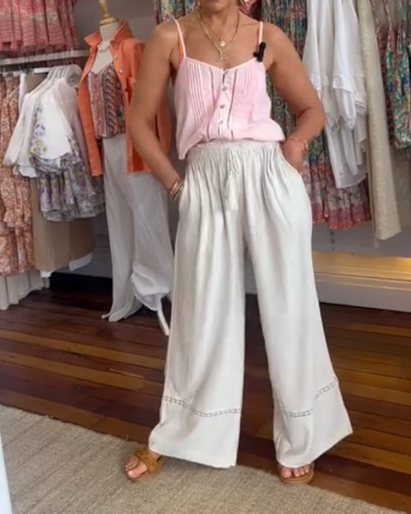 Pantalon large confortable de couleur unie avec poches